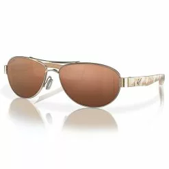 Fin-Nor Sea Shore Sunglasses -Apparel Shop fin nor sea shore sunglasses soft gold tiger conch frame copper lens angled 1